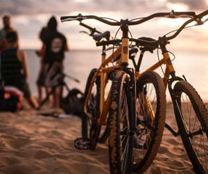 Kona Hybrid Bikes on the beach